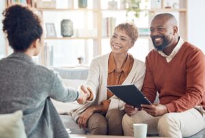 Texas couple meeting with an estate and legacy planning lawyer to protect their family and future.