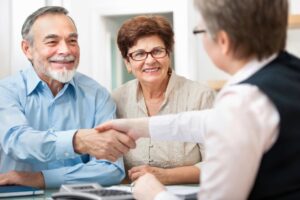 Clients shaking hands with a probate lawyer in Texas for legal support in probate process