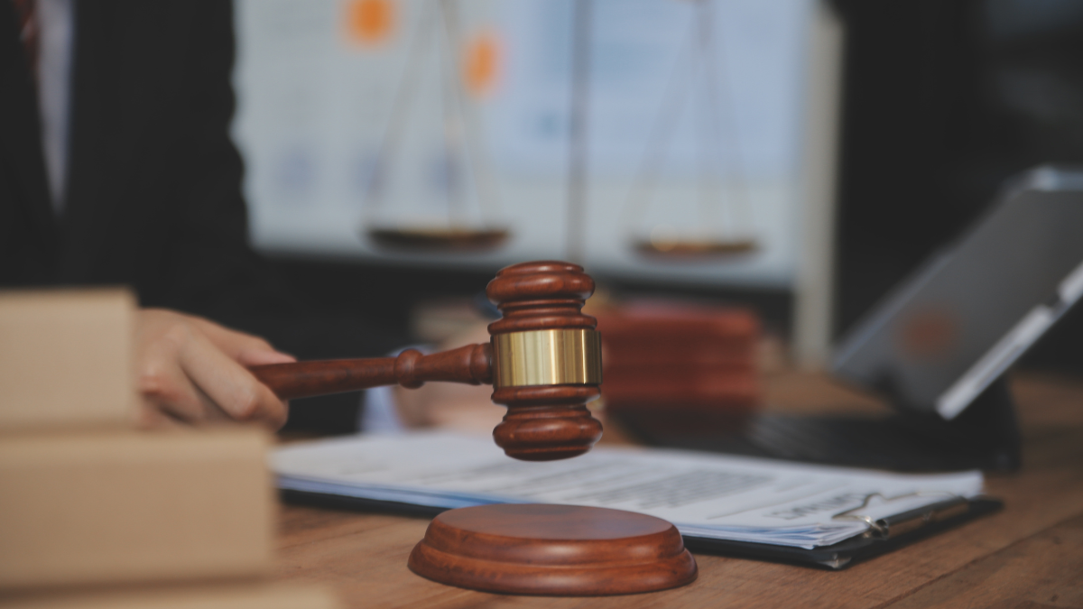 Gavel and legal documents representing trustee vs executor disputes